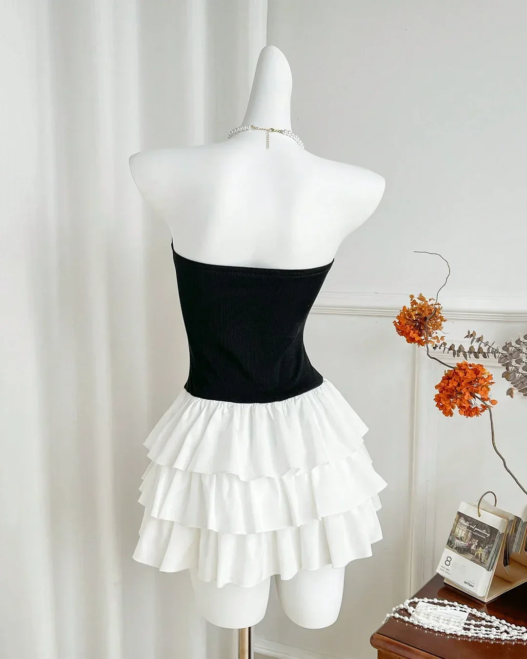 Black and White Strapless Tiered Ruffle Mini Dress - Image 2