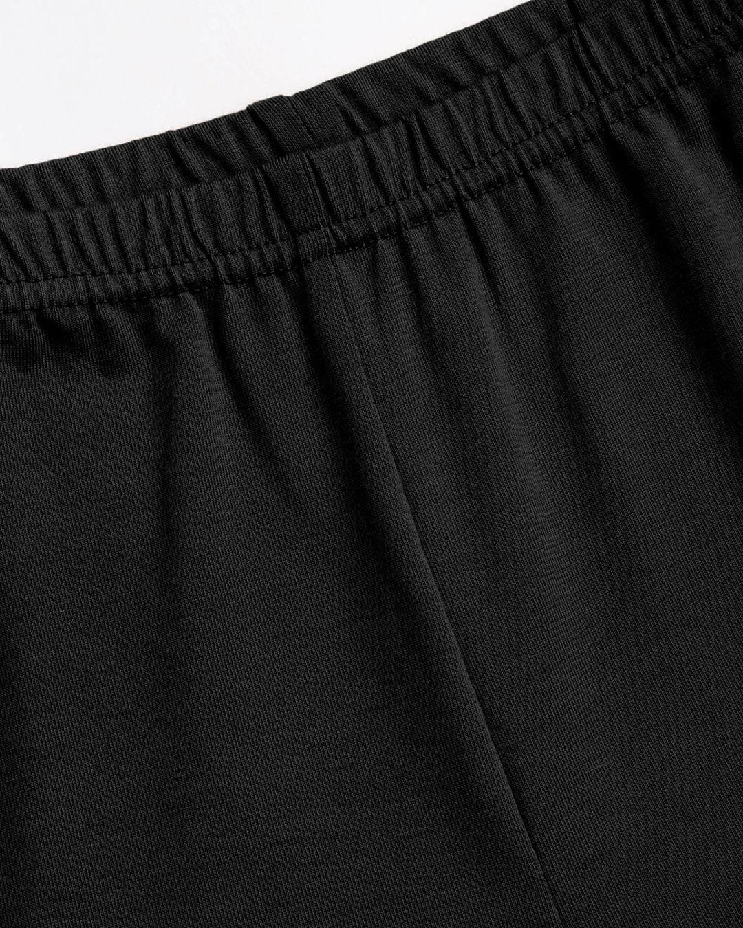 High-Rise Flared Trousers in Black - Image 3