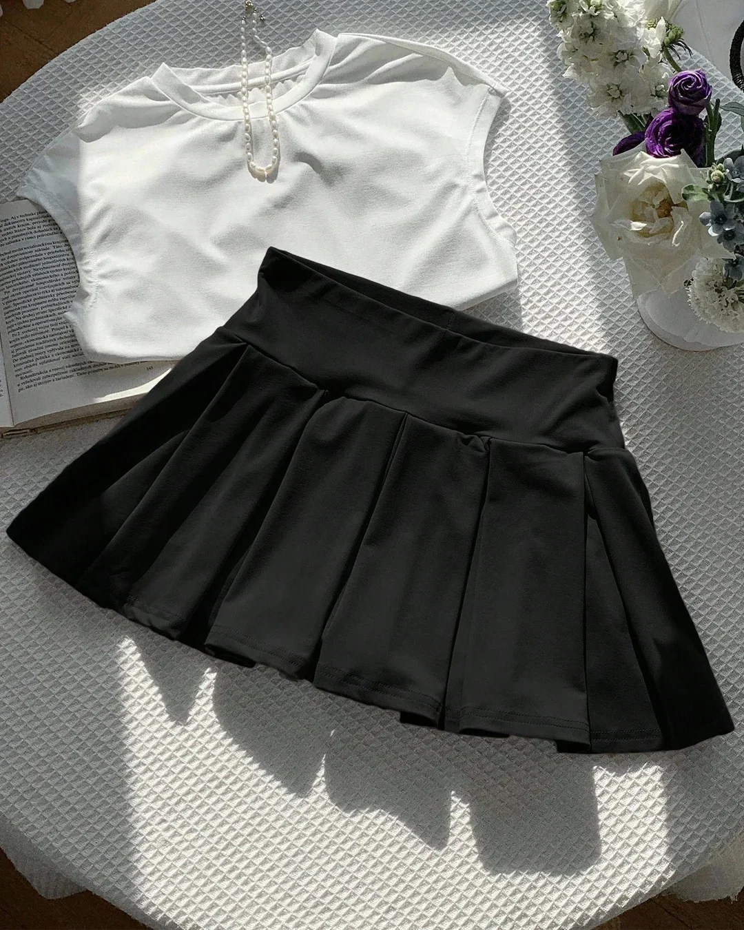 High-Waist Pleated Flared Mini Skirt in Black - Image 2