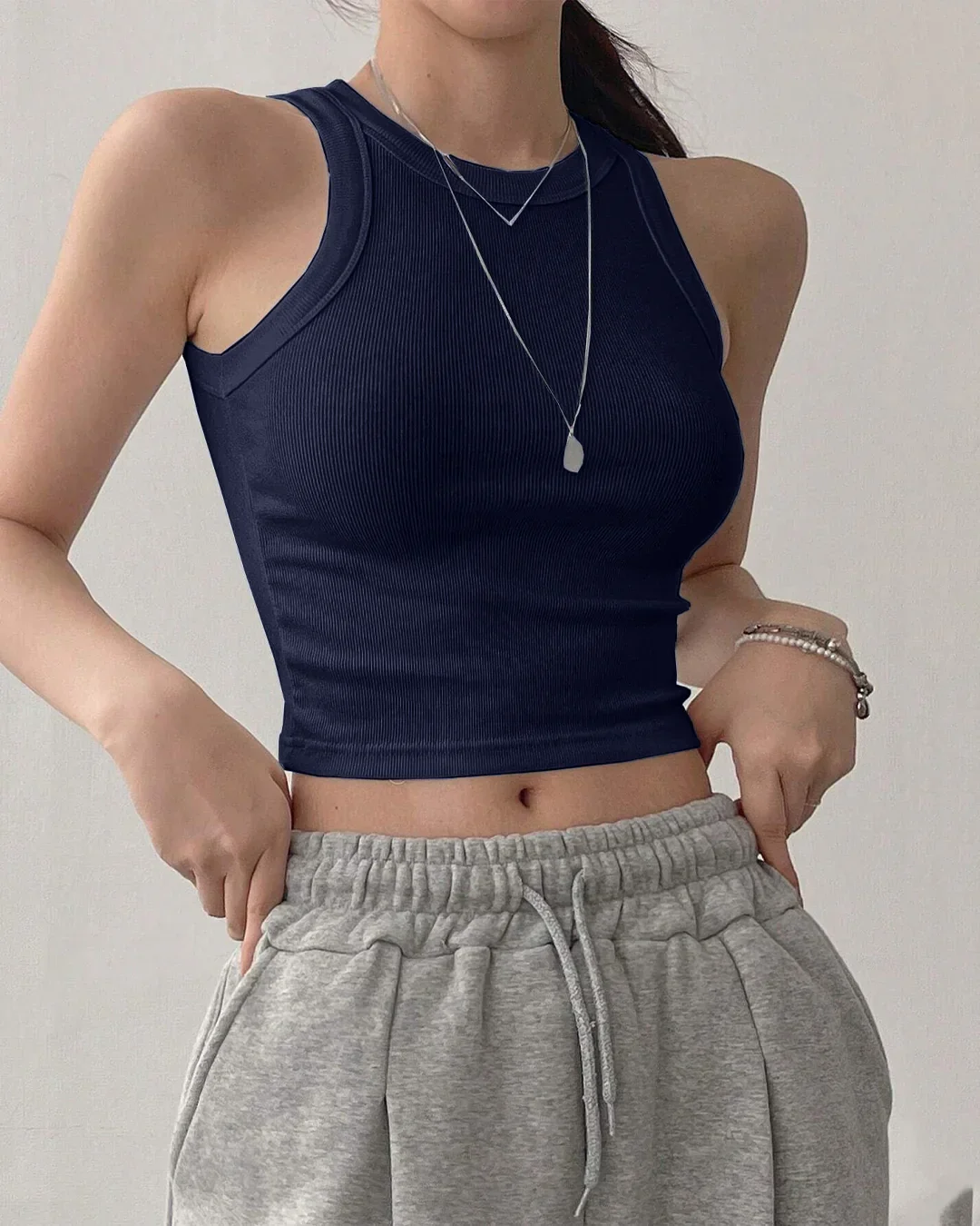 Sleeveless Ribbed High Neck Crop Top in Navy Blue